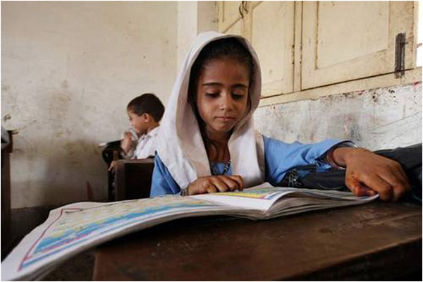 "A pupil at a primary school class in Pakistan - Photo: UNESCO/Akhtar Soomro"