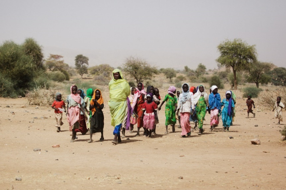 Women and children traveling on foot